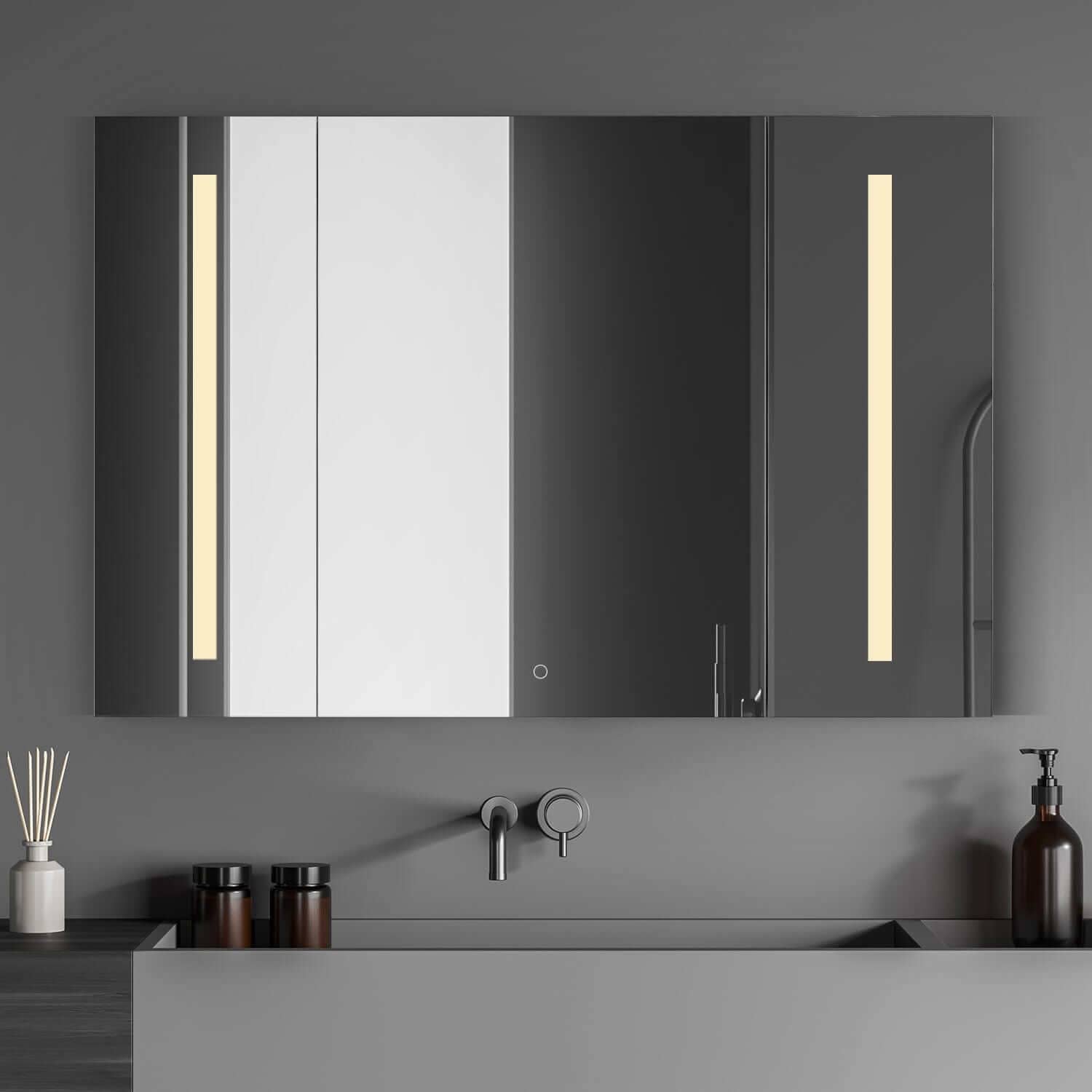 Stylish Catola LED medicine cabinet with frameless design and illuminated mirrors, enhancing modern bathroom aesthetics.