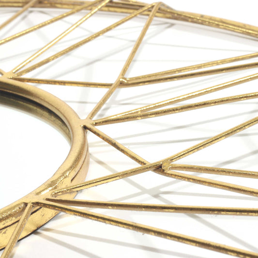 Close-up of Gild Design Hana Accent Mirror w/ textured gold metal frame detail