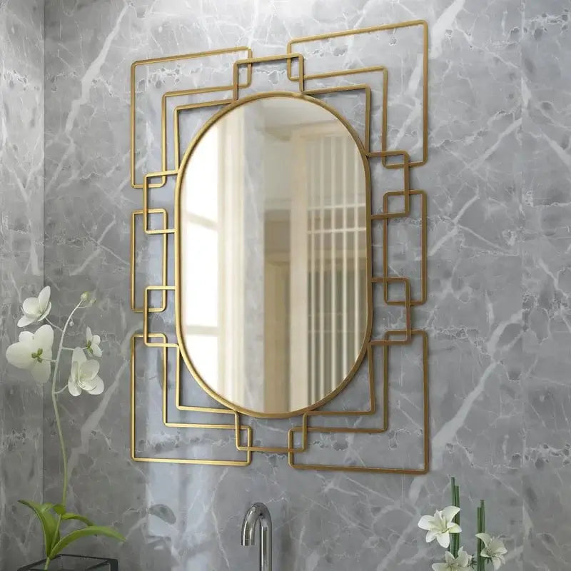 Close-up view of Gild Design Houe Deanna Gold Bathrrom Mirror showcasing detailed art deco frame.