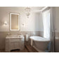 Horizontal LED mirror in contemporary bathroom, featuring defogger and bright lighting