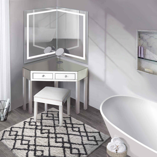 Krugg Modular 24 x 36 Corner LED Mirror - Left or Right installed in a stylish bathroom with vanity table and round bathtub